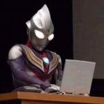 Tiga on a Laptop