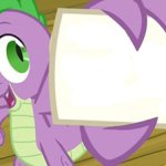 Spike holding a piece of paper