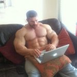 Strong man with computer