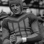 Red Grange Standing By