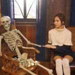 Twice Mina holding a skeleton's hand