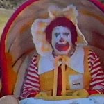 Ronald McDonald in a stroller meme