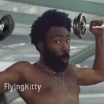 Donald Glover with Dumbells