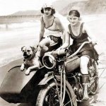 Two flappers on a motorcycle