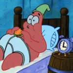 Patrick eating in bed