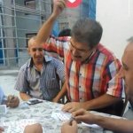TURKISH MAN PLAYING CARDS THROWS A LOVE REACT