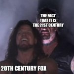insert clever title | THE FACT THAT IT IS THE 21ST CENTURY; 20TH CENTURY FOX | image tagged in man behind man | made w/ Imgflip meme maker