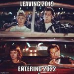covid grease pulp fiction | LEAVING 2019; ENTERING 2022 | image tagged in travolta demotivator | made w/ Imgflip meme maker