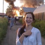 Girl Laughing Near Fire