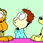 Garfield, Jon and Odie looking up
