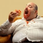 Fat sloppy unhygienic man eating (small)
