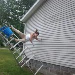 woman falling off a ladder