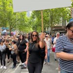 Woman holding sign