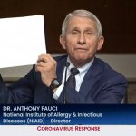 Fauci holding up paper (blank)