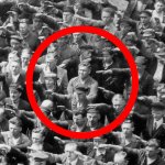 Man in the crowd not doing the nazi salute