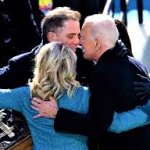 Joe Biden, Hunter, and Jill in a huddle