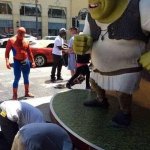2 guys bowing down to shrek while spider man watches template