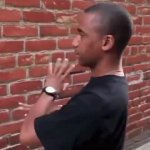 man talks to brick wall GIF Template