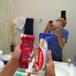 guy holding toothpaste template