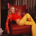 Kylie lounges in hedonist