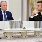 Putin & Macron Sitting At A Long Table