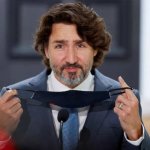 Justin Trudeau unmasked