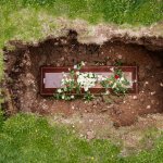 Coffin being buried