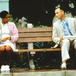Forrest Gump on park bench bus bench with Black woman
