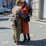 Ukrainian soldier hugs wife