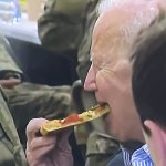 Biden enjoys some pizza.