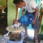 Baby drinking water cooler meme