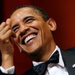 Obama laughing and pointing