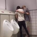 Two guys one Urinal