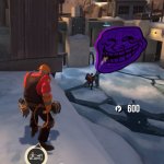 Engineer watches Pyro fight Troll Face