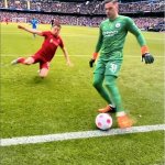 Goalkeeper About To Get Tackled By A Player