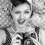 Retro woman with camera