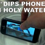 Dips phone in holy water