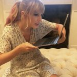 Taylor Swift staring at laptop
