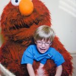 Elmo Loves You! | One of his victims | image tagged in elmo loves you | made w/ Imgflip meme maker