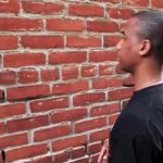 person talking to brick wall GIF Template
