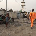 Cool guy walking down the slums