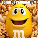peanut M&M | 1 SIGN OF CANNIBALISM | image tagged in peanut m m | made w/ Imgflip meme maker
