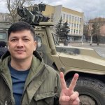 Vitaly Kim With Armored vehicle