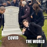 Grant Gustin over grave | COVID THE WORLD | image tagged in grant gustin over grave | made w/ Imgflip meme maker