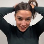 AOC Tying Her Hair