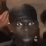 black man staring at camera meme