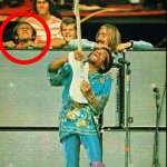 diarrhea at Hendrix concert | WHEN YOU'RE ON STAGE WITH HENDRIX  AND YOU GET DIARRHEA | image tagged in guy with constipated face during hendrix concert,jimi hendrix,classic rock,guitar,music,concert | made w/ Imgflip meme maker