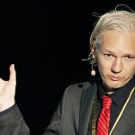 Assange hands it over
