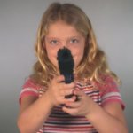 child holding a gun