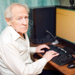 Old man on computer